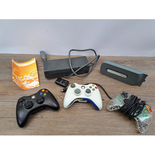 622 - A boxed Xbox 360 Elite System with three controllers etc.