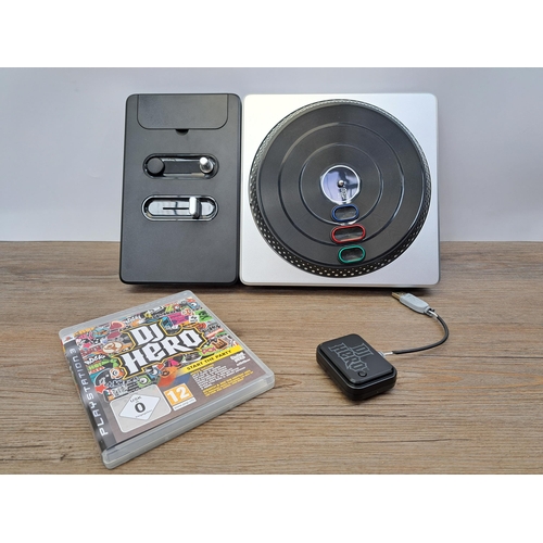 626 - A Sony PlayStation 3 console with DJ Hero unit etc.