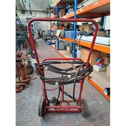 714 - A Welders bottle trolley with AGA jet control 500 regulator