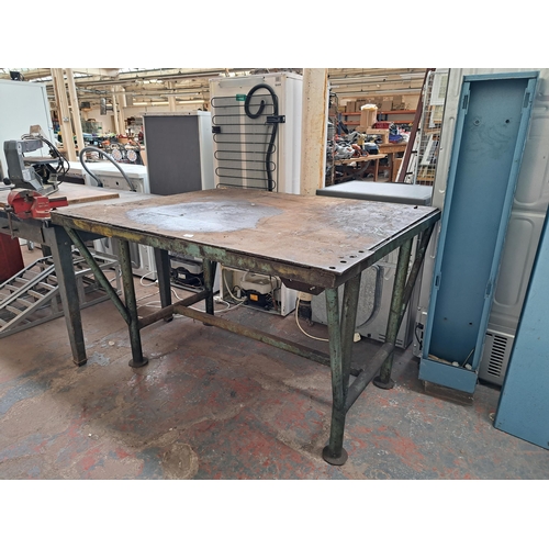 726 - A cast iron welders work bench - approx. 83cm high x 134cm long x 108cm deep