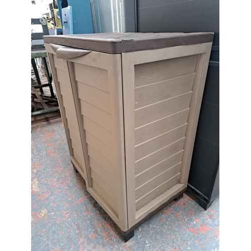 729 - A plastic storage cabinet with two internal shelves - approx. 99cm high x 75cm wide x 50cm deep