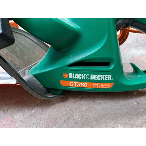 739 - A collection of tools to include three 240v strimmers, Black & Decker 240v hedge cutter etc.