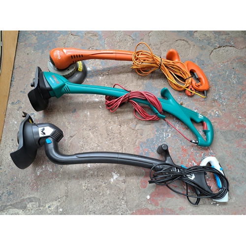 739 - A collection of tools to include three 240v strimmers, Black & Decker 240v hedge cutter etc.