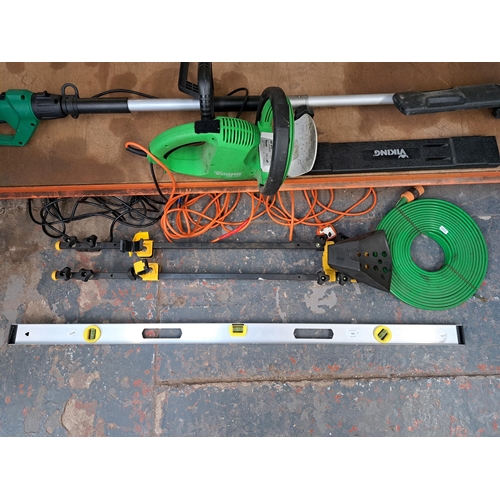 745 - Five items to include Gardenline 240v pole hedge trimmer, Viking HE400 240v hedge trimmer etc.