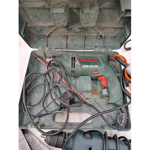 807 - A collection of tools to include cased Bosch 240v hammer drill, Power Devil 240 jigsaw, hand saws et... 