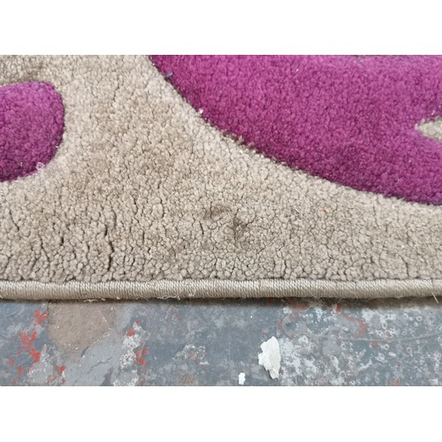 90A - A Dunelm Reflection Natural & Plum rug - approx. 170cm x 120cm