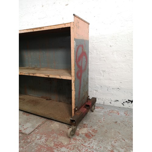 188A - An industrial grey metal three tier shelving unit on castors - approx. 95cm high x 124cm wide x 32cm... 