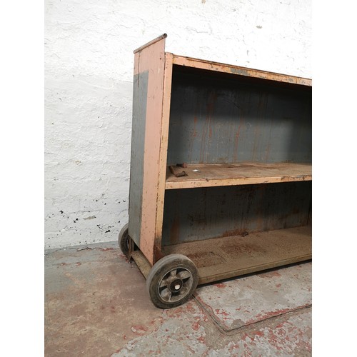 188A - An industrial grey metal three tier shelving unit on castors - approx. 95cm high x 124cm wide x 32cm... 