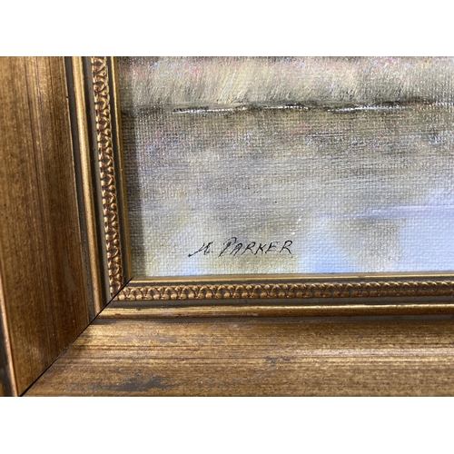 211 - A gilt framed oil on board tiled 