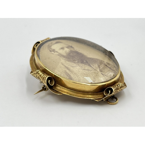 2151 - An antique yellow metal photo locket brooch - approx. gross weight 26.2g and approx. 6cm x 5cm