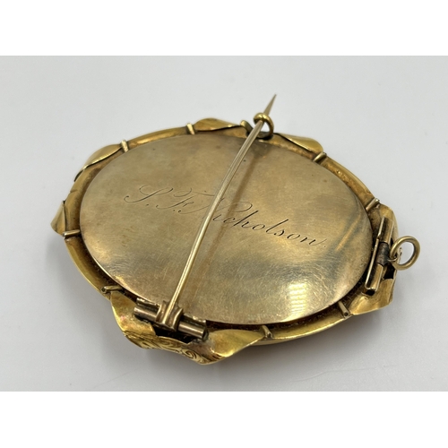 2151 - An antique yellow metal photo locket brooch - approx. gross weight 26.2g and approx. 6cm x 5cm