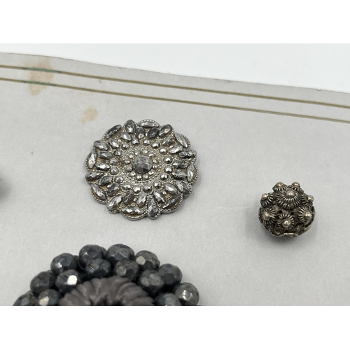 2152 - Nine vintage buttons to include silver etc.