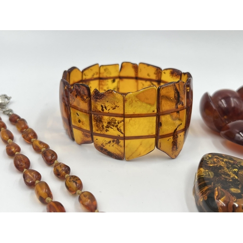 2183 - A collection of vintage amber jewellery to include DAB .925 silver panel bracelet etc.