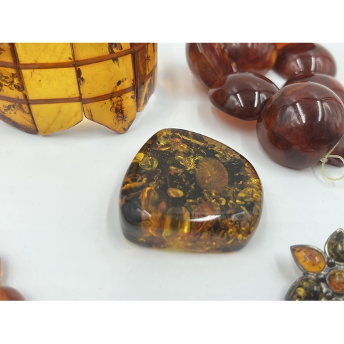 2183 - A collection of vintage amber jewellery to include DAB .925 silver panel bracelet etc.