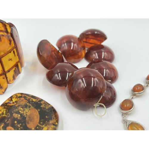 2183 - A collection of vintage amber jewellery to include DAB .925 silver panel bracelet etc.