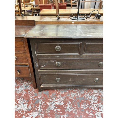 127 - An early 20th century oak chest of two short over two long drawers