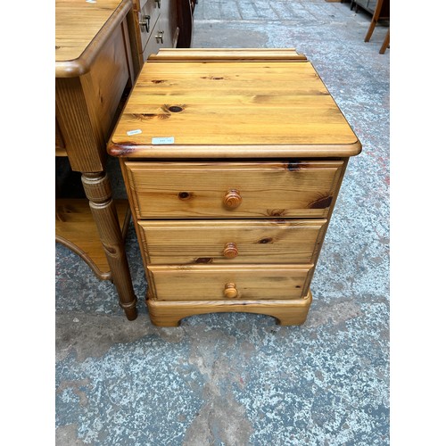 125 - Four pieces of Ducal pine furniture, dressing table, mirror, stool and bedside chest of three drawer... 