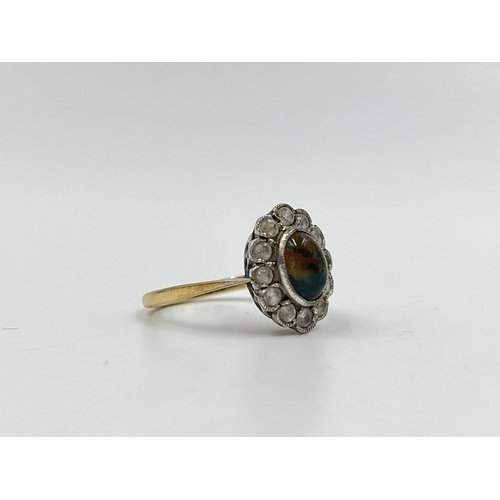 2214 - A 9ct gold CZ and moss agate halo ring, size J½ - approx. gross weight 2.42g