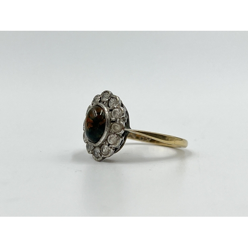 2214 - A 9ct gold CZ and moss agate halo ring, size J½ - approx. gross weight 2.42g