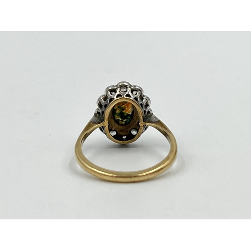 2214 - A 9ct gold CZ and moss agate halo ring, size J½ - approx. gross weight 2.42g