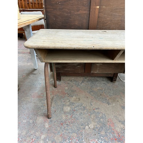 168 - A mid 20th century beech and wrought metal twin school desk