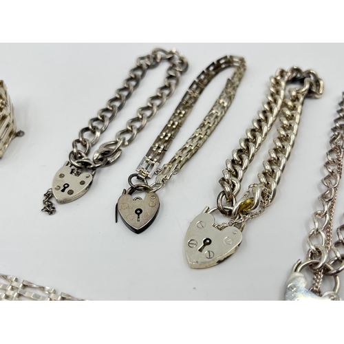 2231 - Six hallmarked sterling silver bracelets with heart shaped padlock clasps - approx. gross weight 88g