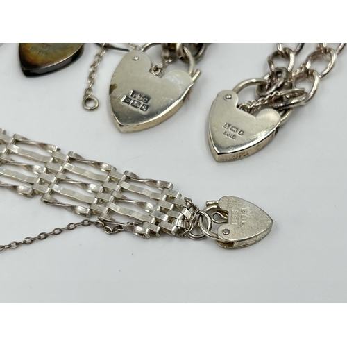 2231 - Six hallmarked sterling silver bracelets with heart shaped padlock clasps - approx. gross weight 88g