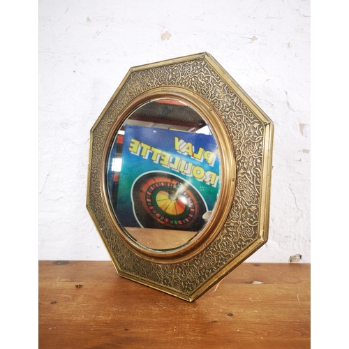 223 - An early/mid 20th century Middle Eastern brass framed octagonal wall mirror - approx. 43cm high x 43... 