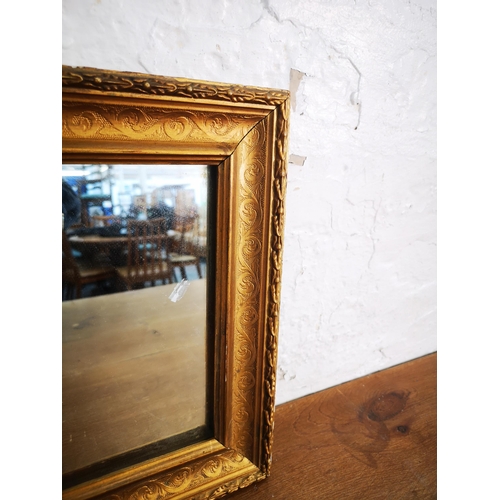 227 - A 19th century gilt framed wall mirror - approx. 31cm high x 49cm wide