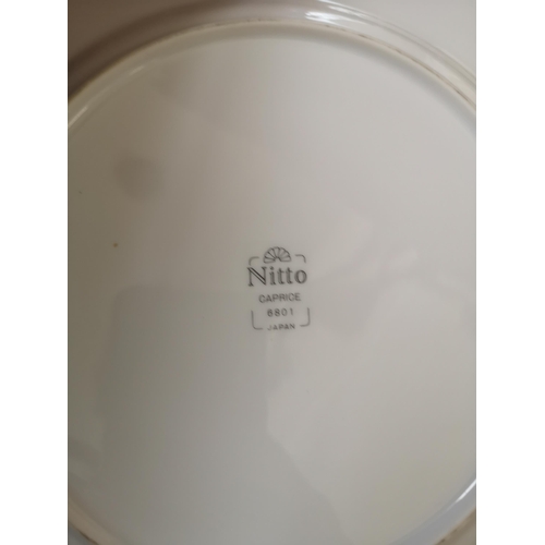 891 - Two boxes containing a large collection of Nitto Caprice ceramics