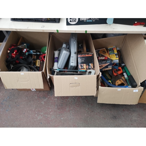 893 - Three boxes containing tools to include Black & Decker plunge router, cased masonry drill bit sets, ... 