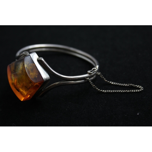 2160 - A .925 silver amber bangle - approx. gross weight 32g