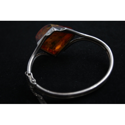 2160 - A .925 silver amber bangle - approx. gross weight 32g