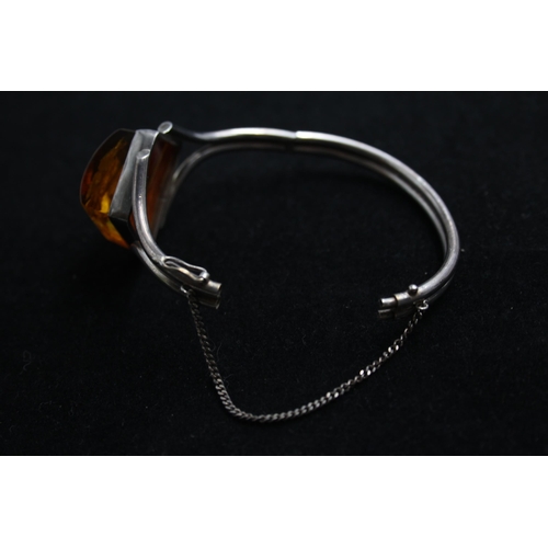 2160 - A .925 silver amber bangle - approx. gross weight 32g