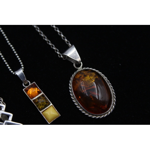 2162 - Four .925 silver amber pendant necklaces - approx. gross weight 29g