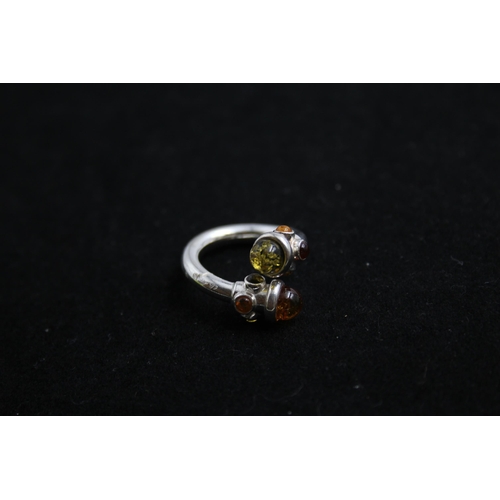 2166 - Five .925 silver amber rings - approx. gross weight 32g