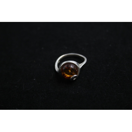 2166 - Five .925 silver amber rings - approx. gross weight 32g