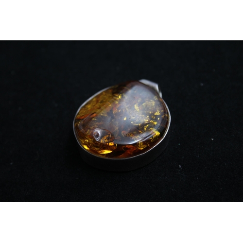 2175 - Four .925 silver statement amber pendants - approx. gross weight 63g