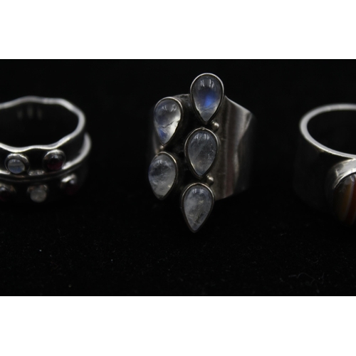 2201 - Four .925 silver gemstone statement rings - approx. gross weight 40g