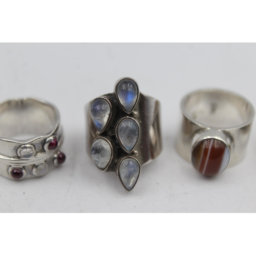 2201 - Four .925 silver gemstone statement rings - approx. gross weight 40g