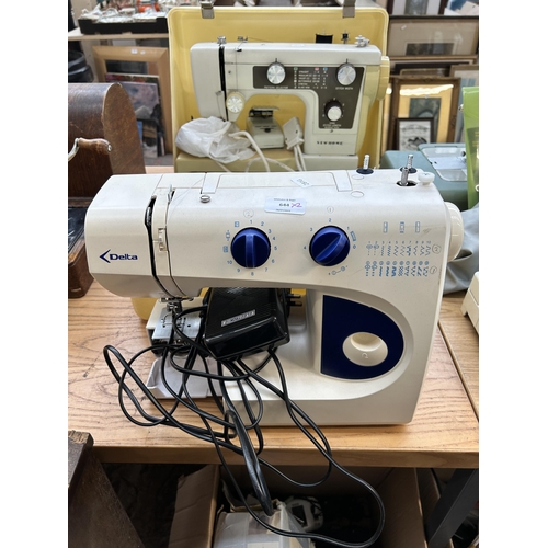 644 - Two sewing machines, one cased Janome New Holme 641 electric with foot pedal and instruction manual ... 