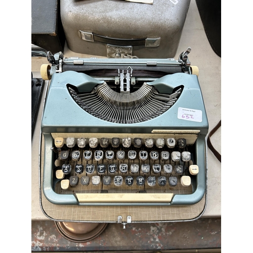 652 - Two cased typewriters, one Remington portable and one Imperial Good Companion with instructions and ... 