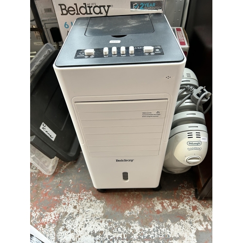 657 - Six items to include boxed Beldray 6ltr air cooler, boxed JDW hand held steam cleaner, De'Longhi Bam... 