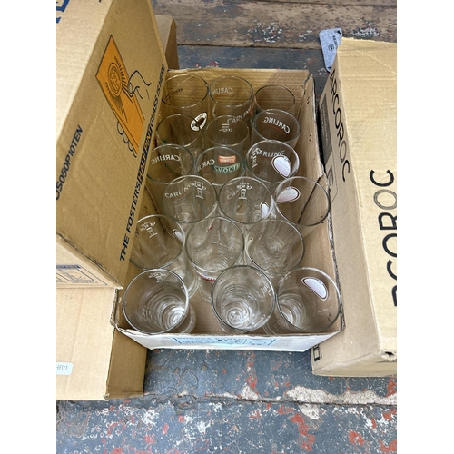 922 - Eleven boxes and two plastic trays containing a large collection of advertising drinking glasses to ... 