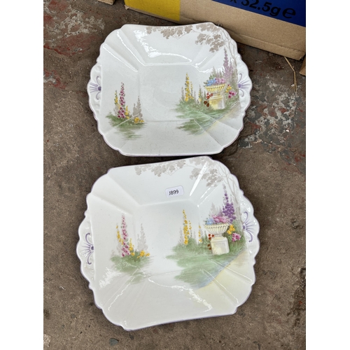 925 - Three boxes containing two Art Deco Shelley hand painted plates, costume jewellery, Carlton Ware mil... 