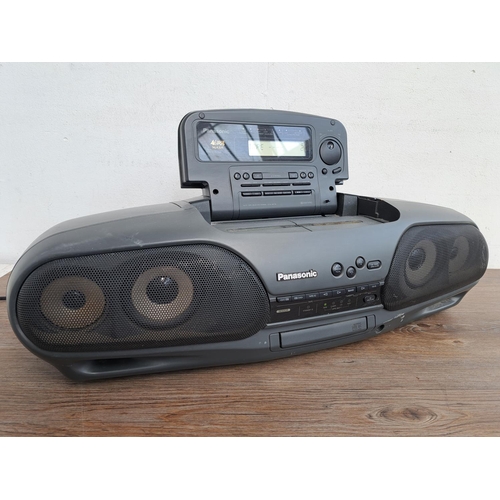 526 - Two items, one Panasonic RX-DY707 portable CD player/radio/twin cassette deck and one boxed pair of ... 