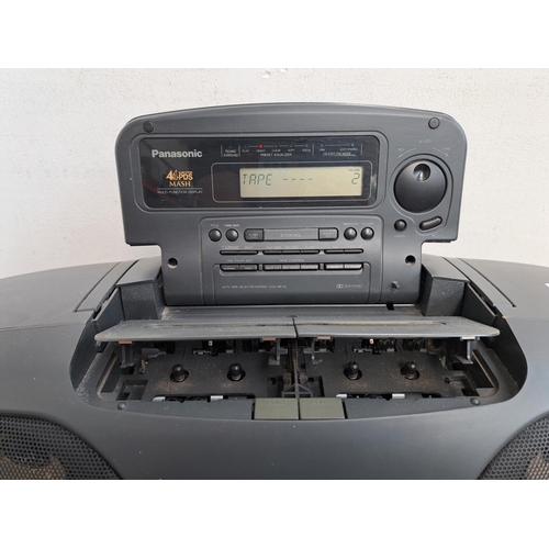 526 - Two items, one Panasonic RX-DY707 portable CD player/radio/twin cassette deck and one boxed pair of ... 