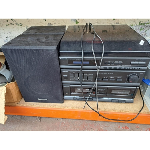 528 - A large collection of items to include Panasonic stereo system with speakers, vintage Koss headphone... 