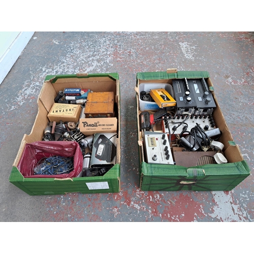 544 - Two boxes containing voltmeter, tape eraser, record cleaner, valves, AEG Optimator 3, boxed Shure SF... 