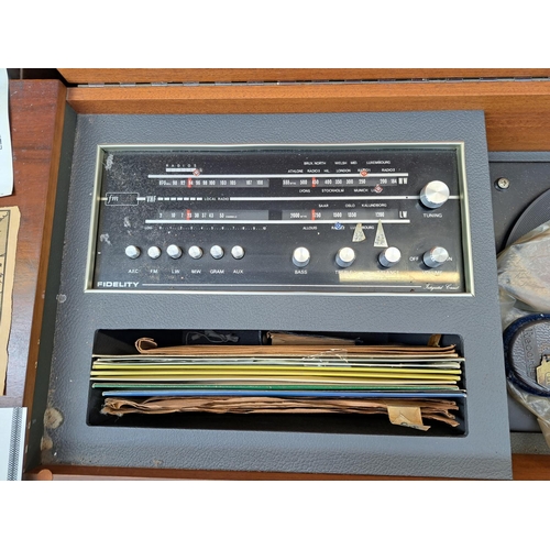 547 - A vintage Fidelity R.G. 35 stereo radiogram fitted with BSR three-speed autochanger turntable and Fi... 